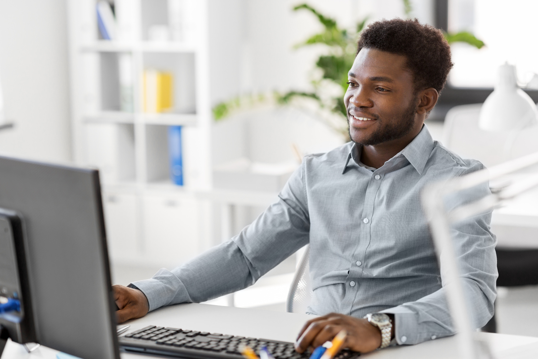 African Businessman with Computer 